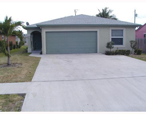 311 West 37th Street Riviera Beach, FL 33404 - Photo 1 of 1 Primary Photo