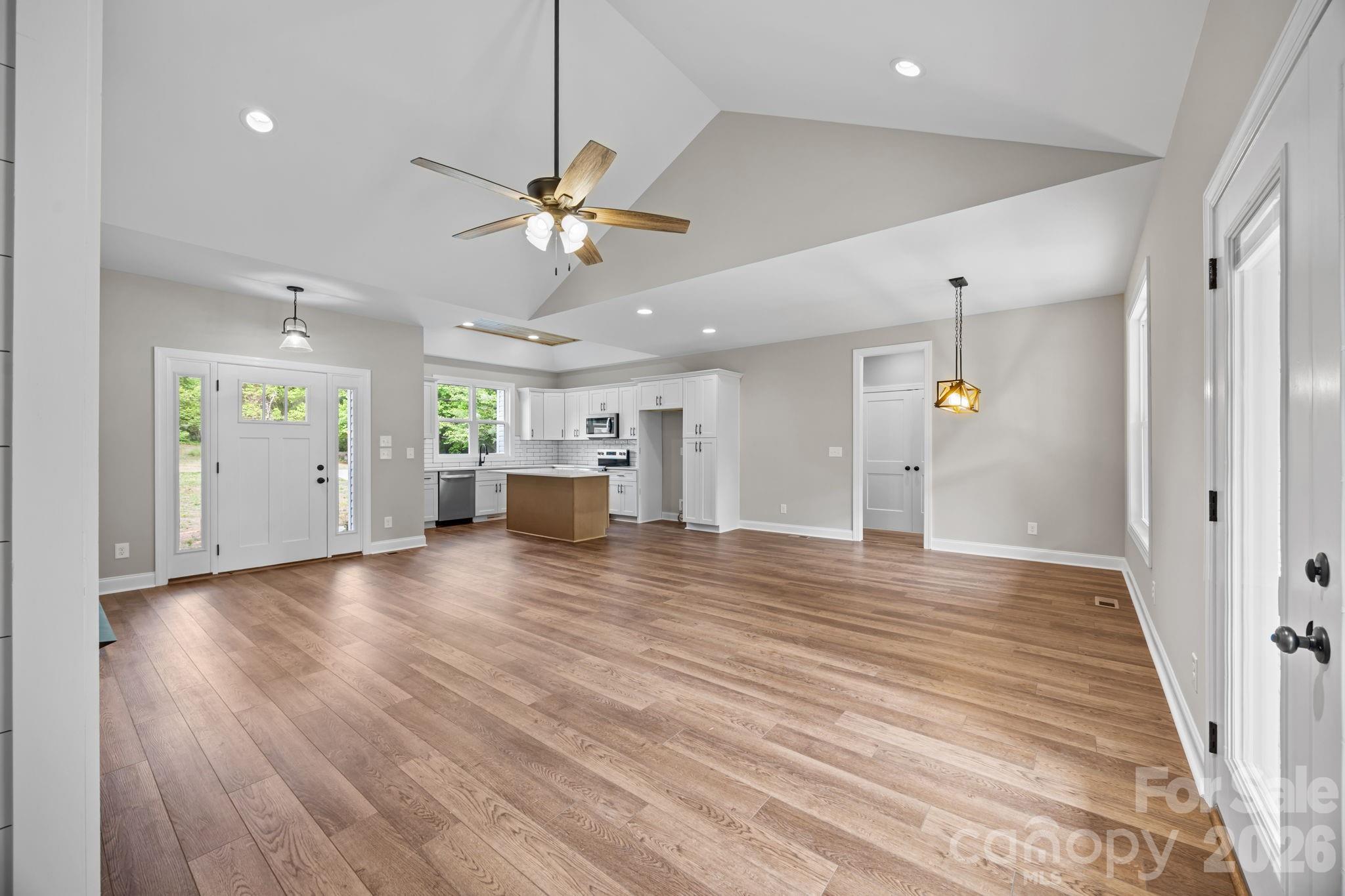 5037 Faith Road Salisbury, NC 28146 - Photo 12 of 45 wooden floor in an empty room with a window
