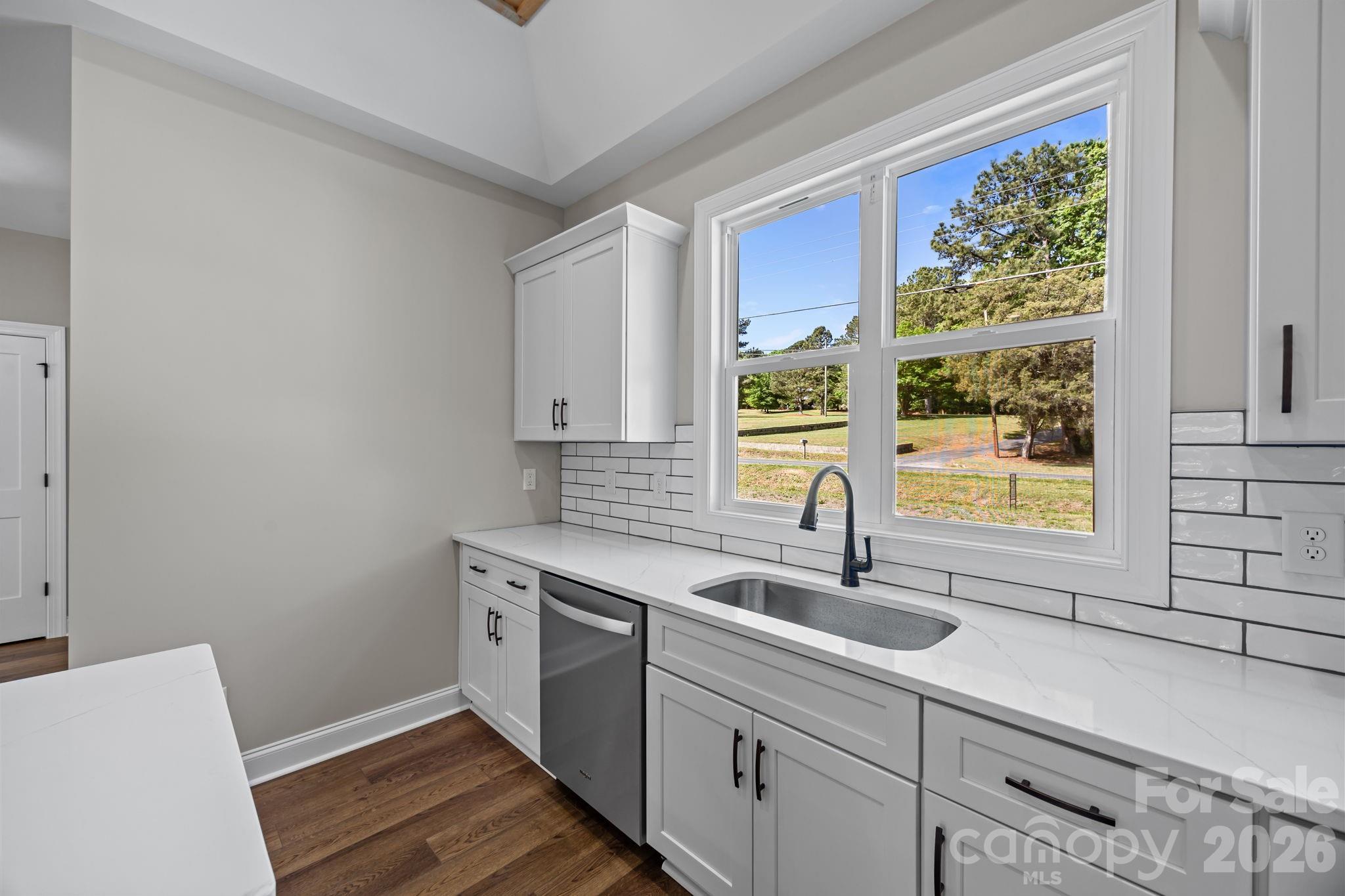 5037 Faith Road Salisbury, NC 28146 - Photo 19 of 45 a bathroom with a sink and a window