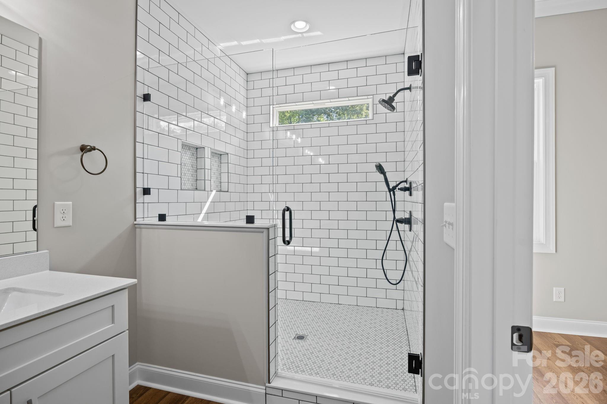 5037 Faith Road Salisbury, NC 28146 - Photo 25 of 45 a bathroom with a shower