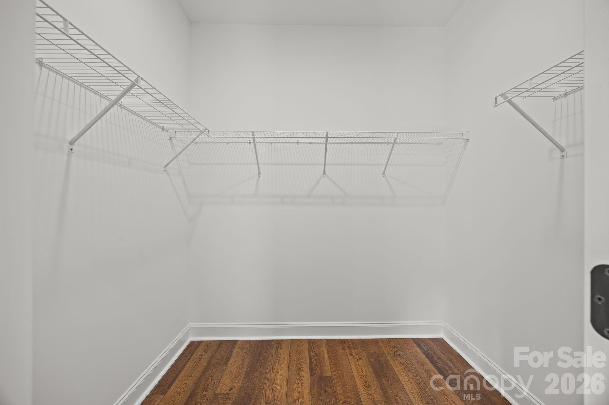 5037 Faith Road Salisbury, NC 28146 - Photo 26 of 45 a view of a room with racks on the wall