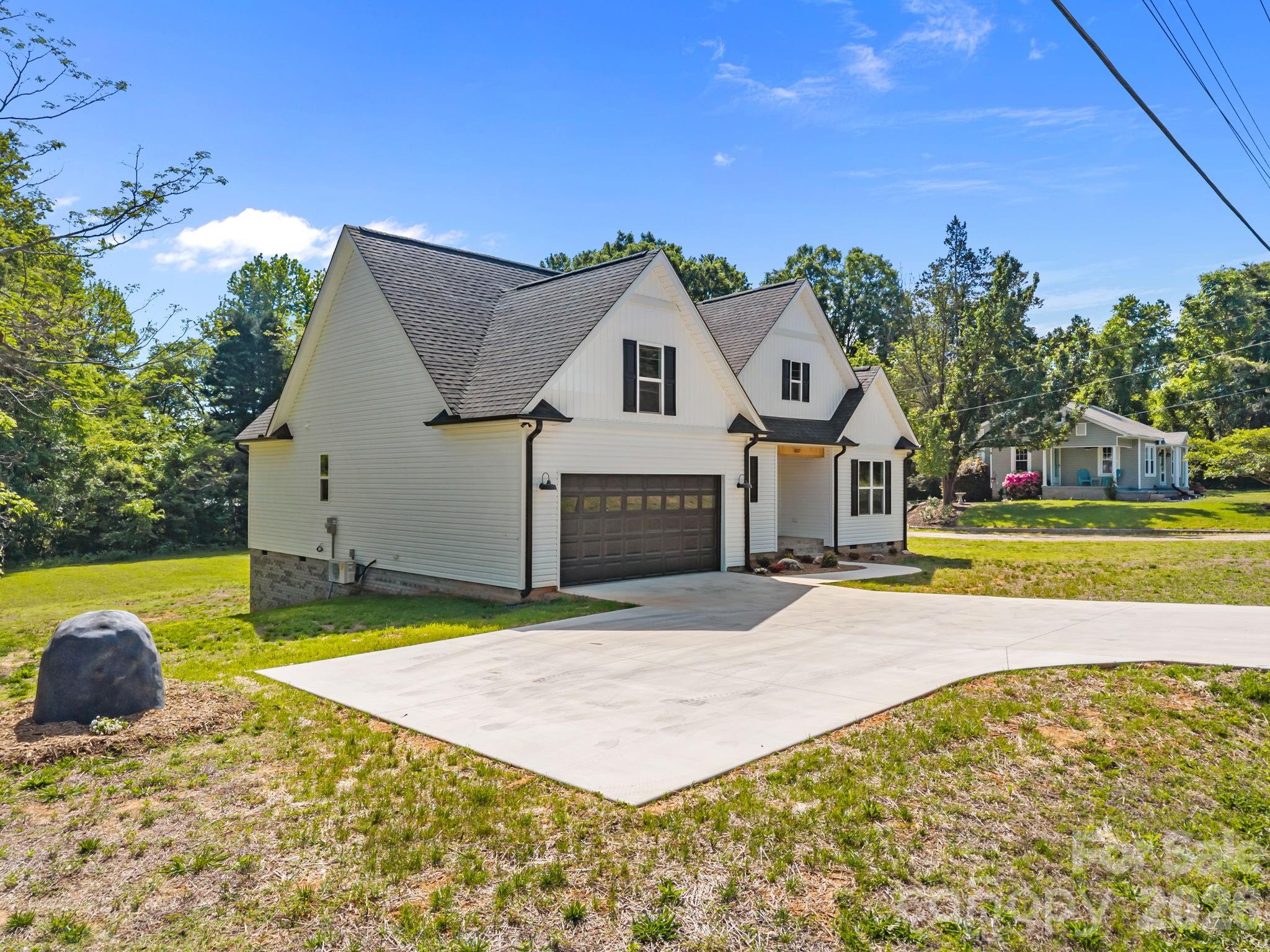 5037 Faith Road Salisbury, NC 28146 - Photo 35 of 45 a front view of a house with a yard