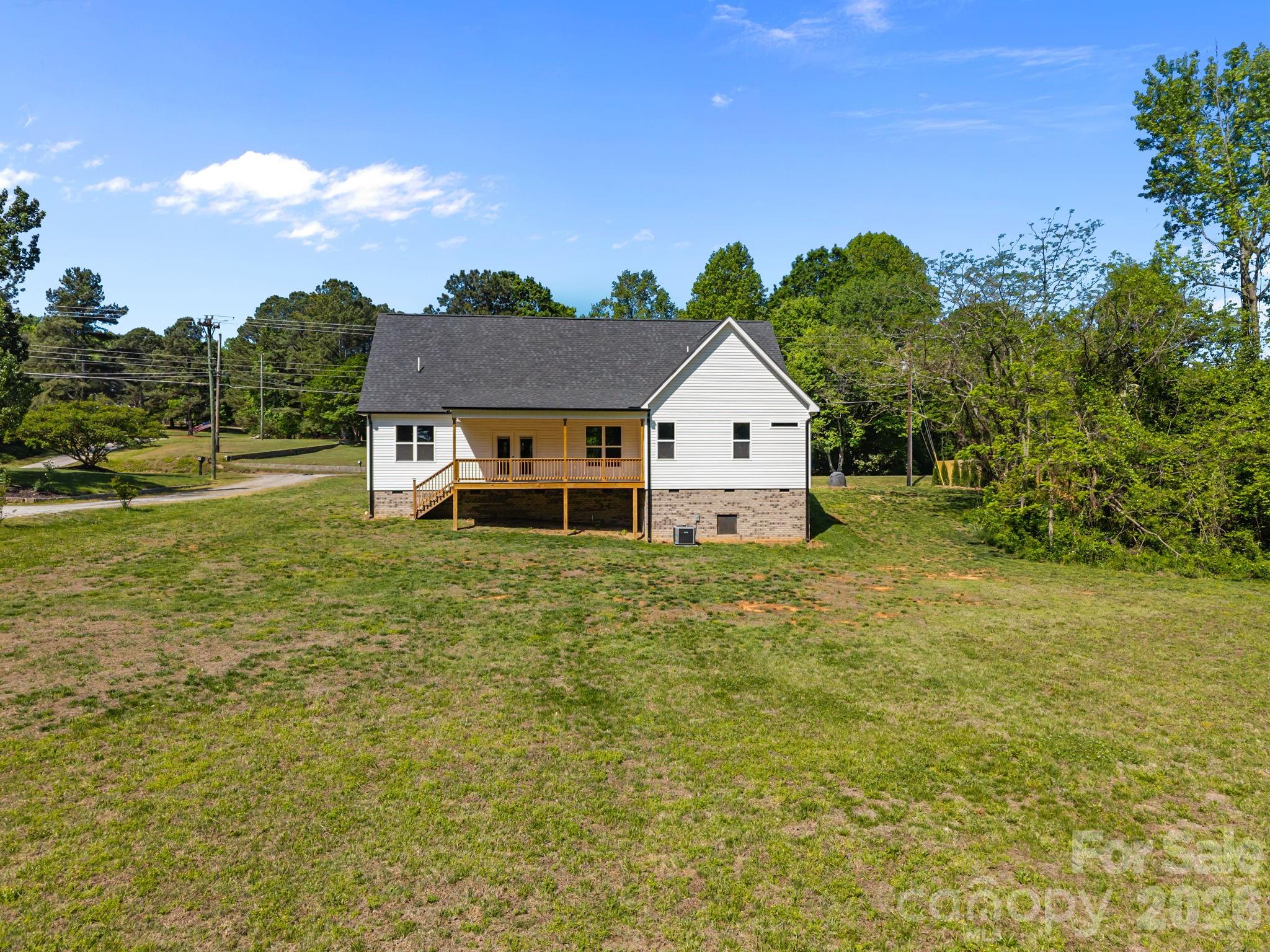 5037 Faith Road Salisbury, NC 28146 - Photo 37 of 45 a view of a house with a yard
