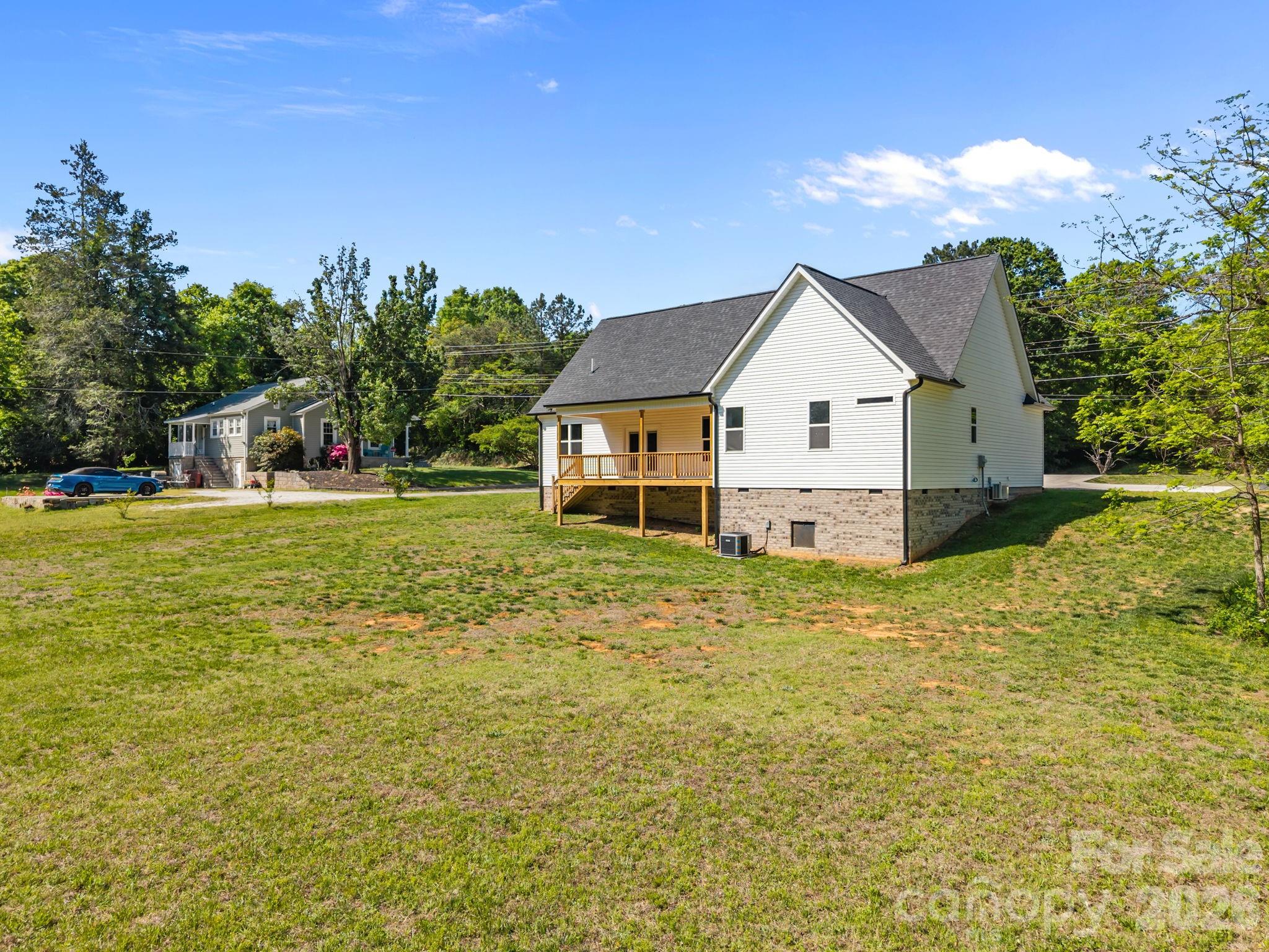 5037 Faith Road Salisbury, NC 28146 - Photo 38 of 45 a view of a house with a yard