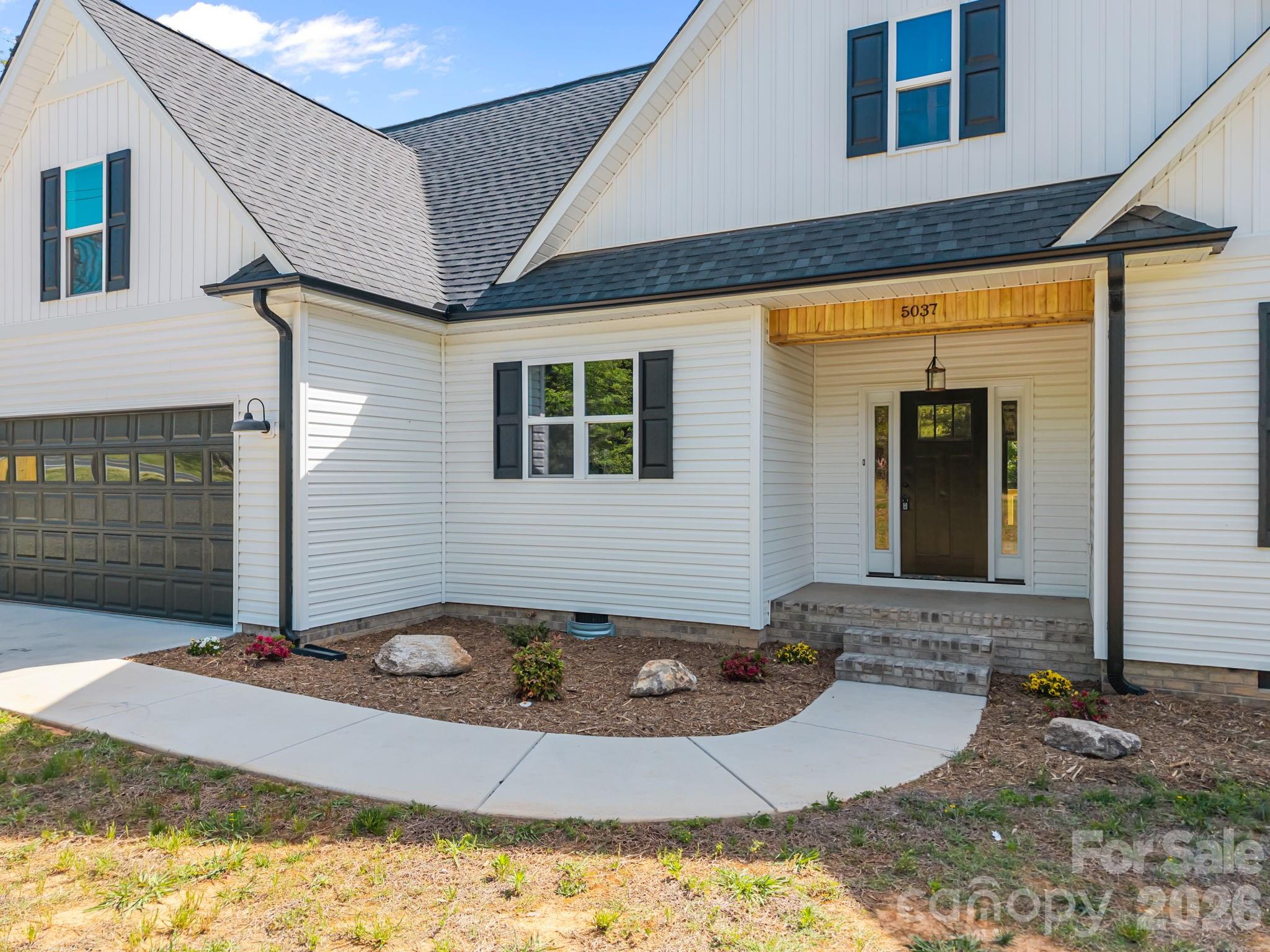 5037 Faith Road Salisbury, NC 28146 - Photo 4 of 45 a front view of a house