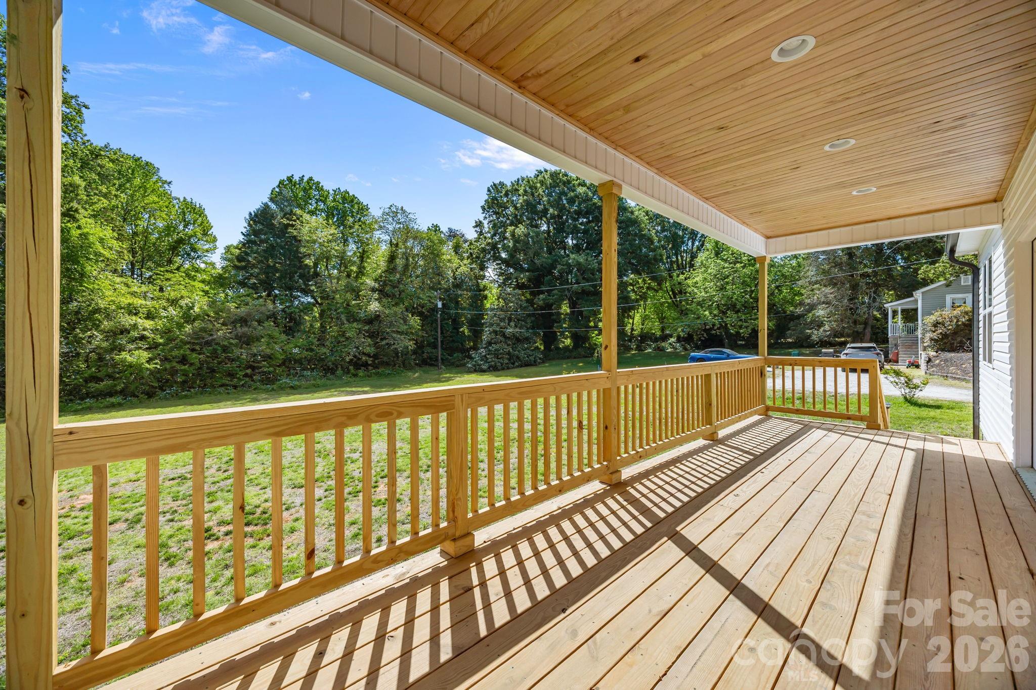 5037 Faith Road Salisbury, NC 28146 - Photo 41 of 45 a view of balcony with wooden floor