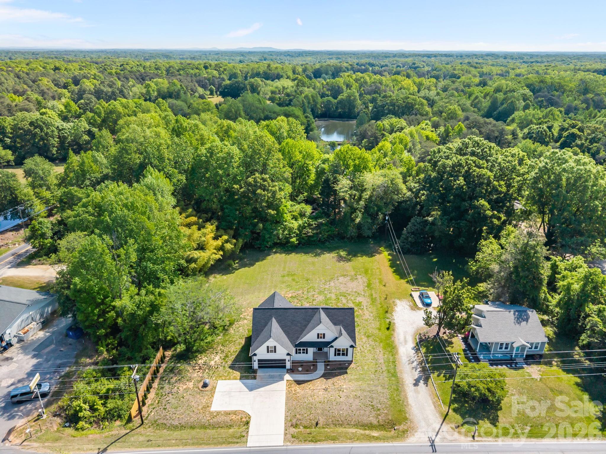 5037 Faith Road Salisbury, NC 28146 - Photo 44 of 45 an aerial view of a house with yard swimming pool and outdoor seating