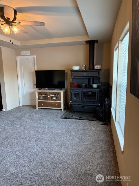 94 Grafton Road Wauconda, WA 98859 - Photo 16 of 37 a living room with furniture and a flat screen tv