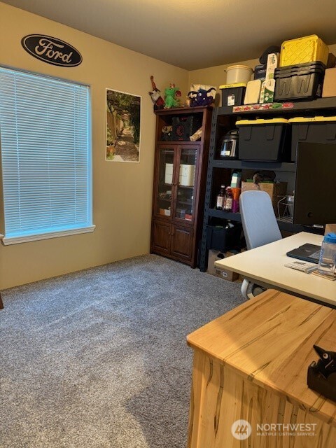 94 Grafton Road Wauconda, WA 98859 - Photo 31 of 37 a bed room with a bed and a television