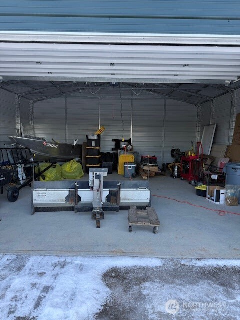 94 Grafton Road Wauconda, WA 98859 - Photo 37 of 37 a living room with furniture and a chandelier