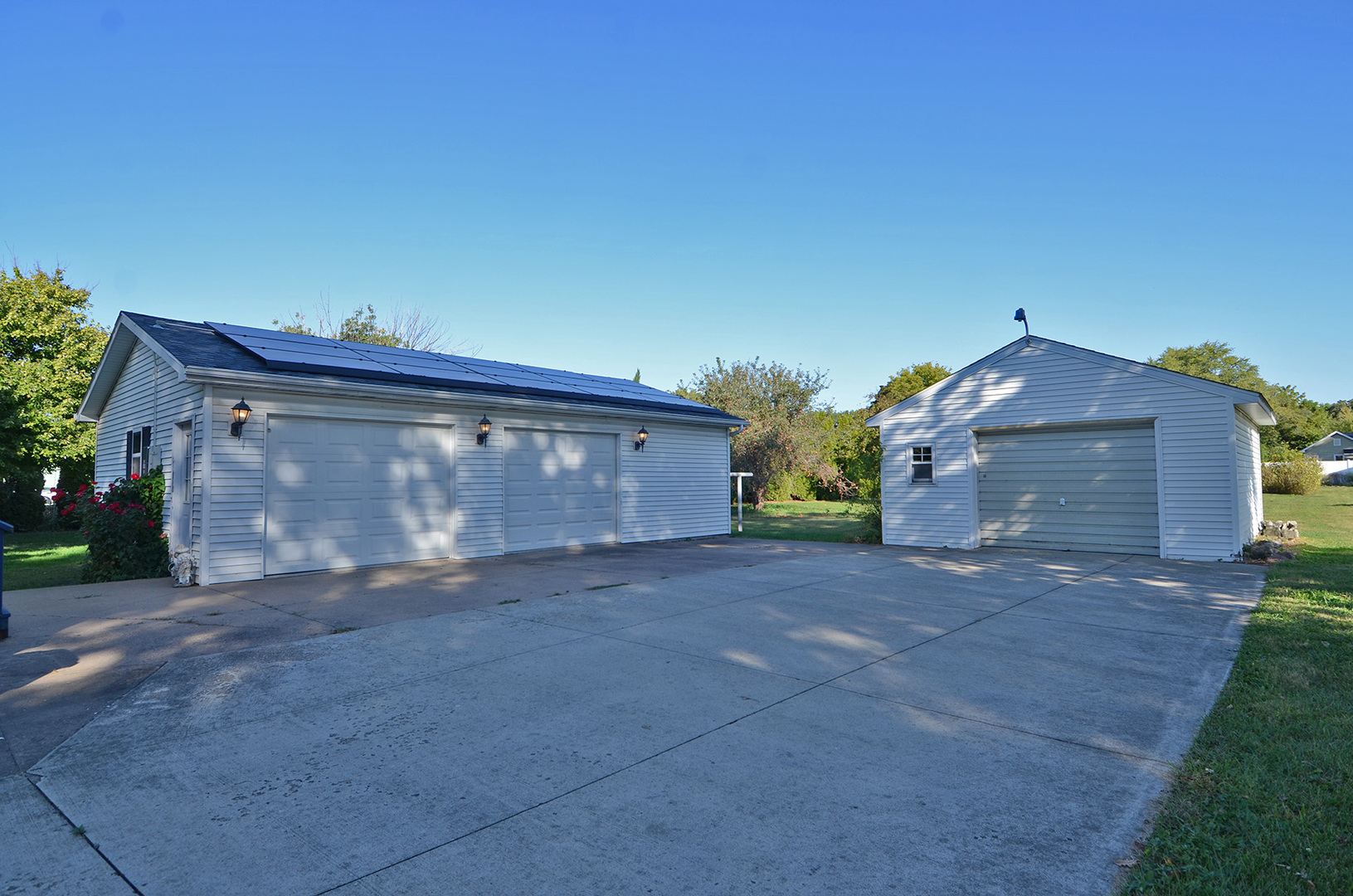 708 Lundy Street Streator, IL 61364 - Photo 19 of 21 a view of a house with a yard and garage