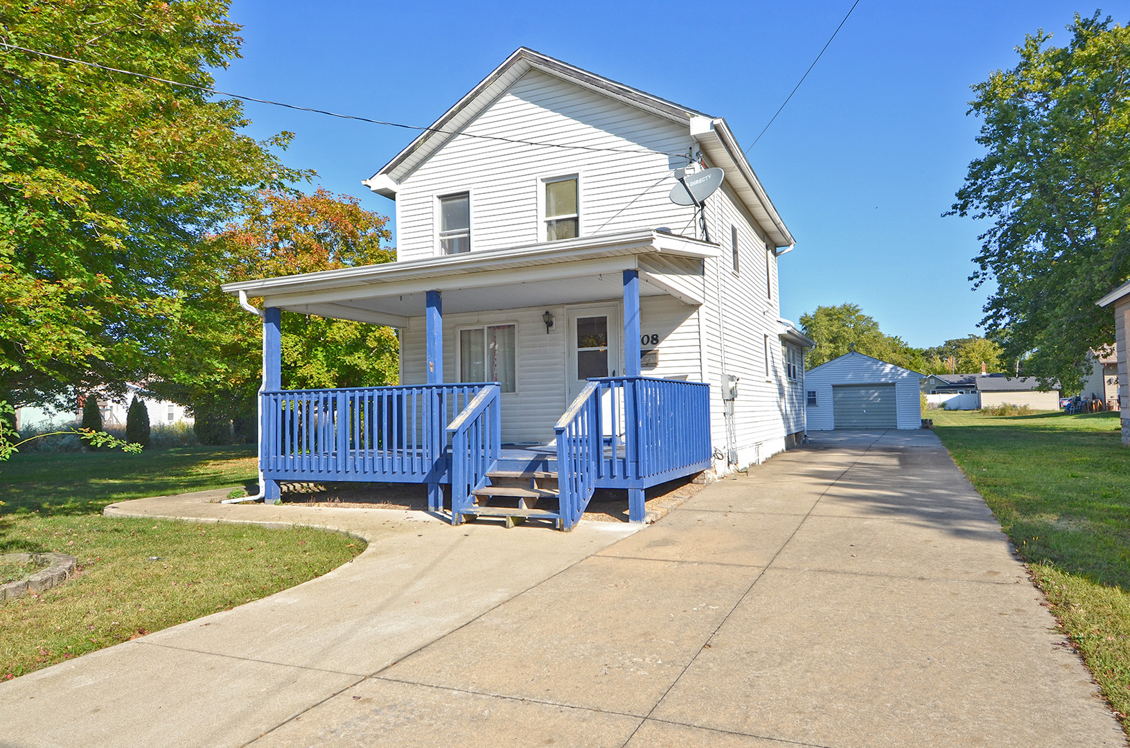 708 Lundy Street Streator, IL 61364 - Photo 2 of 21 a view of a house with yard and a garden