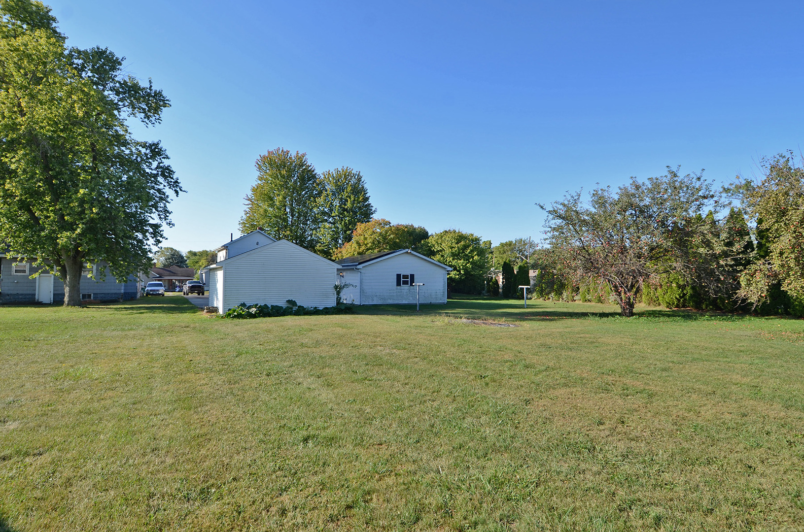 708 Lundy Street Streator, IL 61364 - Photo 21 of 21 a house with trees in front of it