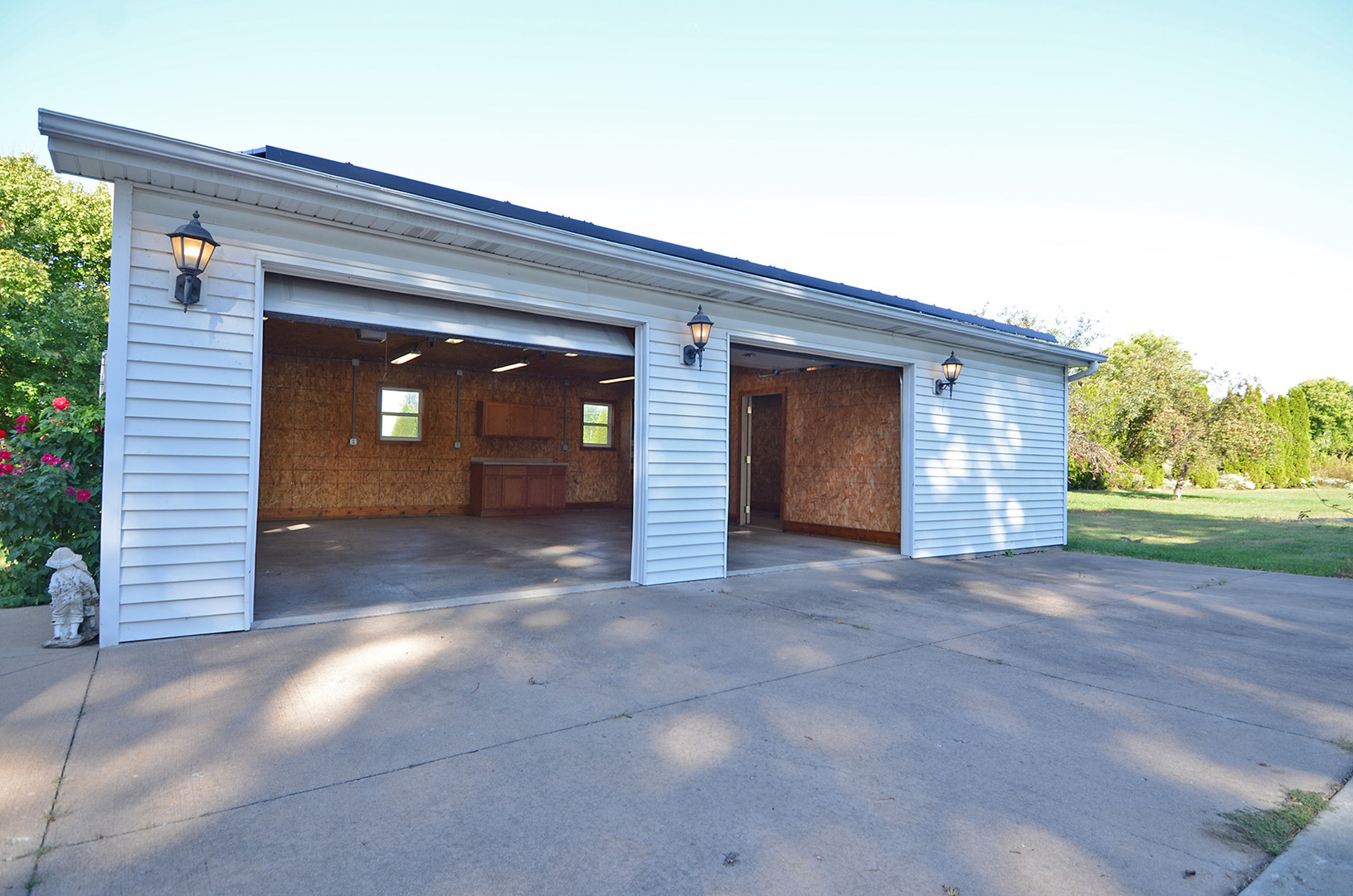 708 Lundy Street Streator, IL 61364 - Photo 3 of 21 a view of a house with a yard and garage