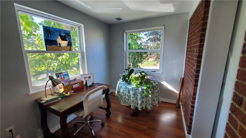12106 Center Street Irwin, PA 15642 - Photo 14 of 27 a living room with furniture and a potted plant