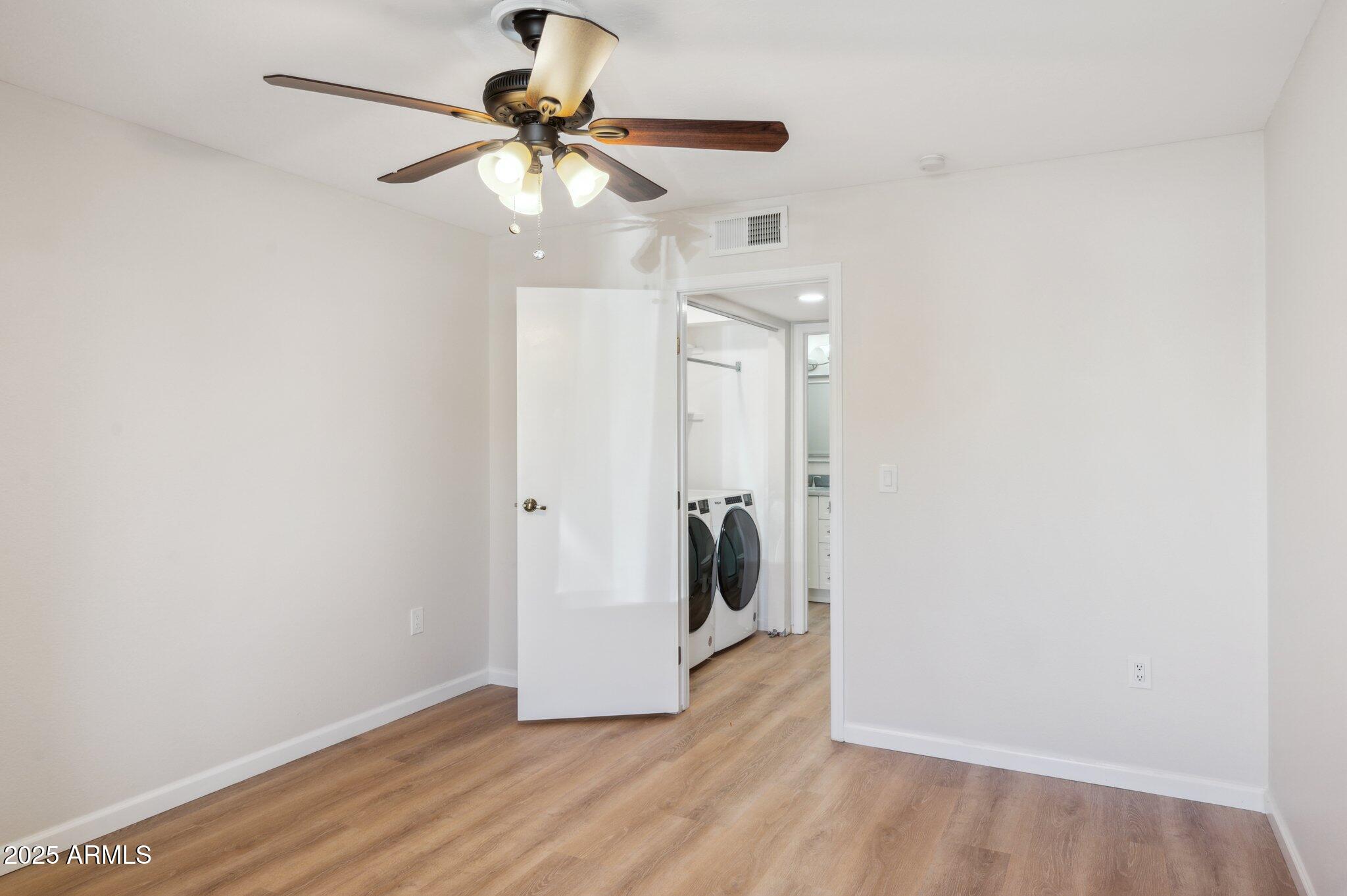 1021 South Greenfield Road, Unit 1106 Mesa, AZ 85206 - Photo 11 of 36 Second bedrm view towards hallway