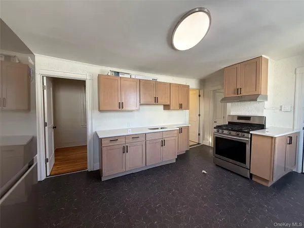 a large kitchen with cabinets