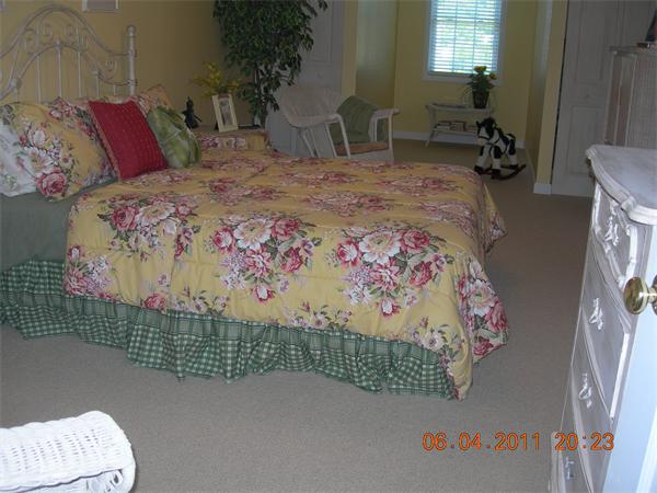159 Allen Road, Unit 15 Billerica, MA 01821 - Photo 13 of 21 a bedroom with a bed and a dresser in it