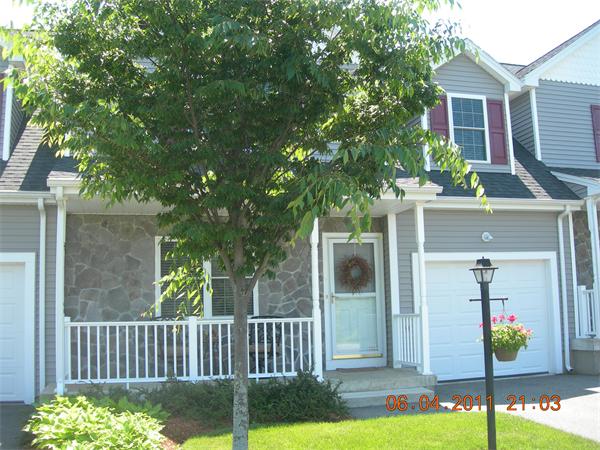 159 Allen Road, Unit 15 Billerica, MA 01821 - Photo 2 of 21 a front view of a house with garden