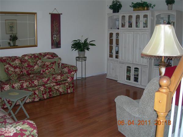 159 Allen Road, Unit 15 Billerica, MA 01821 - Photo 3 of 21 a living room with furniture and a flat screen tv