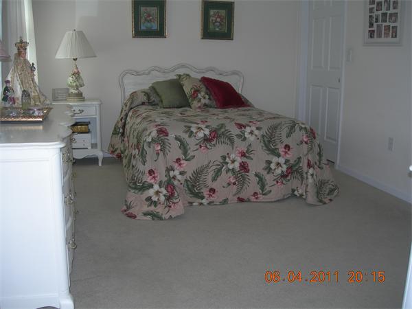 159 Allen Road, Unit 15 Billerica, MA 01821 - Photo 10 of 21 a bed with a white comforter and pillows