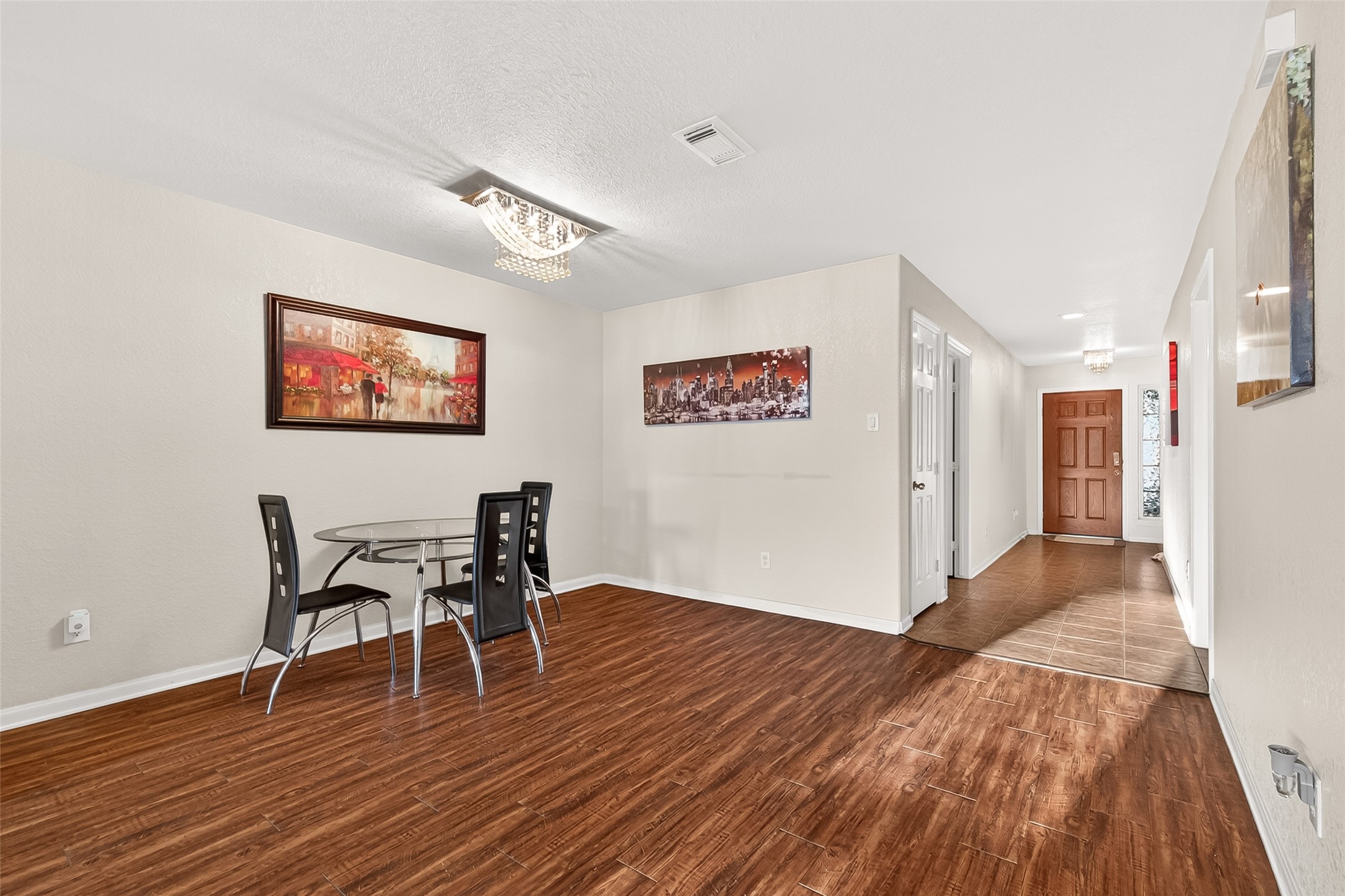 16715 Mackenzie Mesa Drive Spring, TX 77379 - Photo 8 of 50 a view of a livingroom with furniture and wooden floor