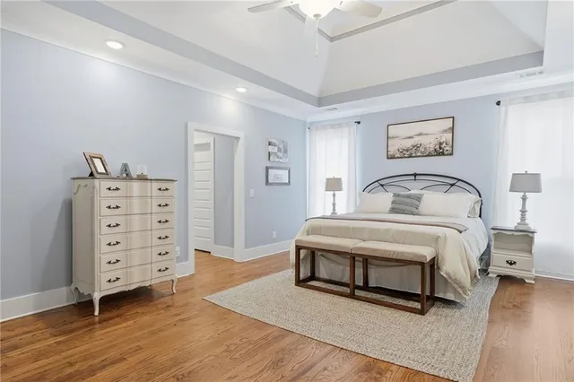a bedroom with a bed and a walk in closet