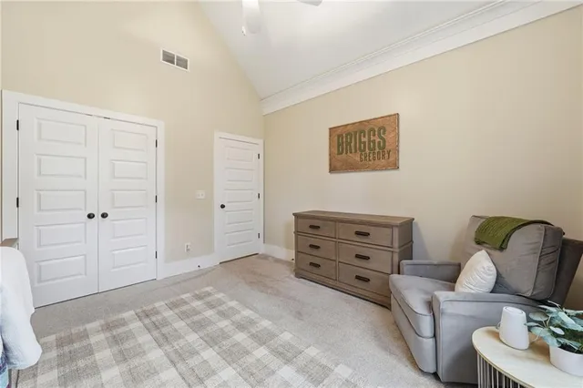 a bedroom with a bed and furniture