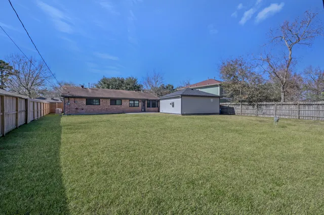 a house view with a garden space