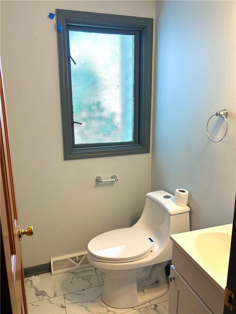105 Rondelay Drive Cheektowaga, NY 14227 - Photo 10 of 34 1ST FLOOR HALF BATHROOM