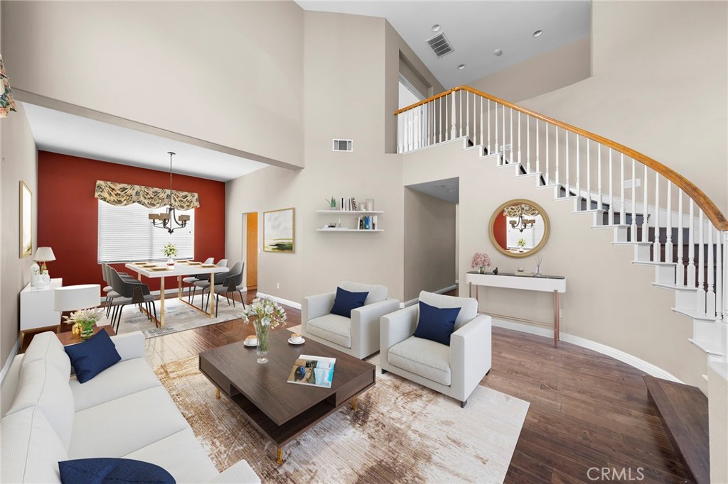 7116 Sapri Place Rancho Cucamonga, CA 91701 - Photo 12 of 52 a living room with furniture and a large window