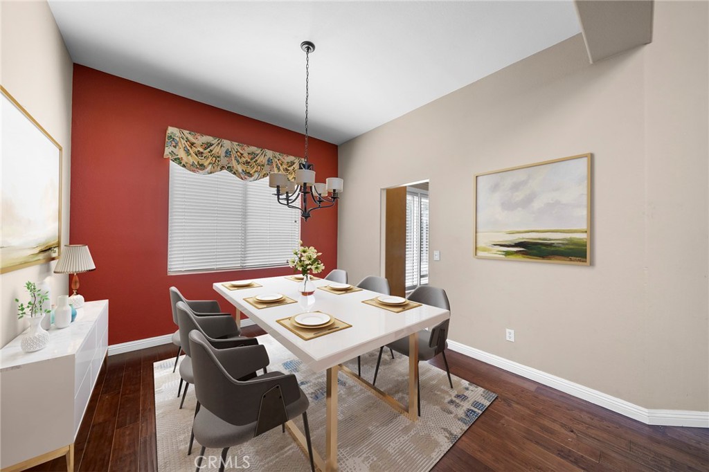 7116 Sapri Place Rancho Cucamonga, CA 91701 - Photo 13 of 52 a view of a dining room with furniture window and wooden floor
