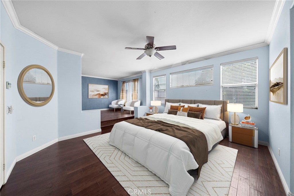 7116 Sapri Place Rancho Cucamonga, CA 91701 - Photo 15 of 52 a bedroom with a bed and a chandelier