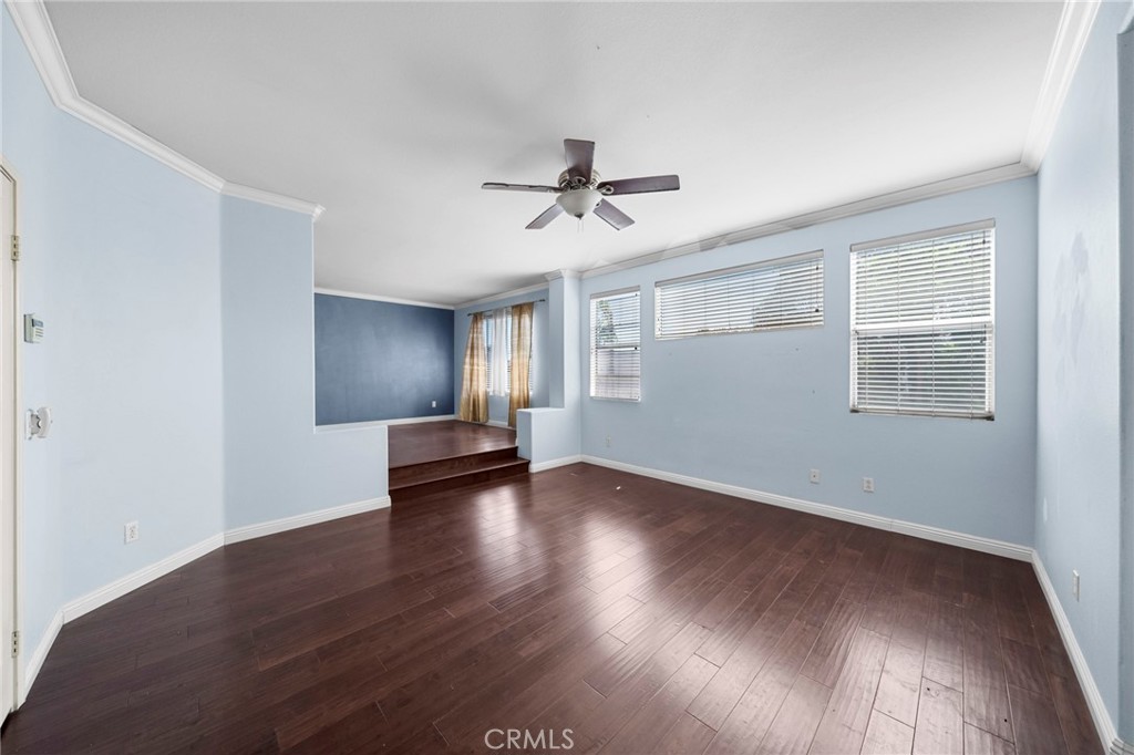 7116 Sapri Place Rancho Cucamonga, CA 91701 - Photo 34 of 52 a view of empty room with wooden floor and fan