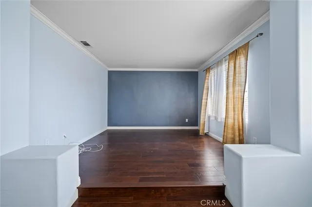 a large white bathroom with a sink a mirror and a shower