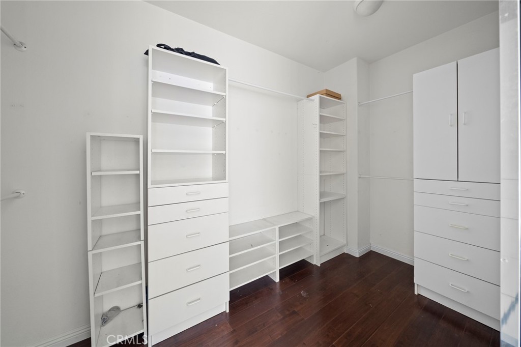 7116 Sapri Place Rancho Cucamonga, CA 91701 - Photo 40 of 52 a view of walk in closet with empty racks