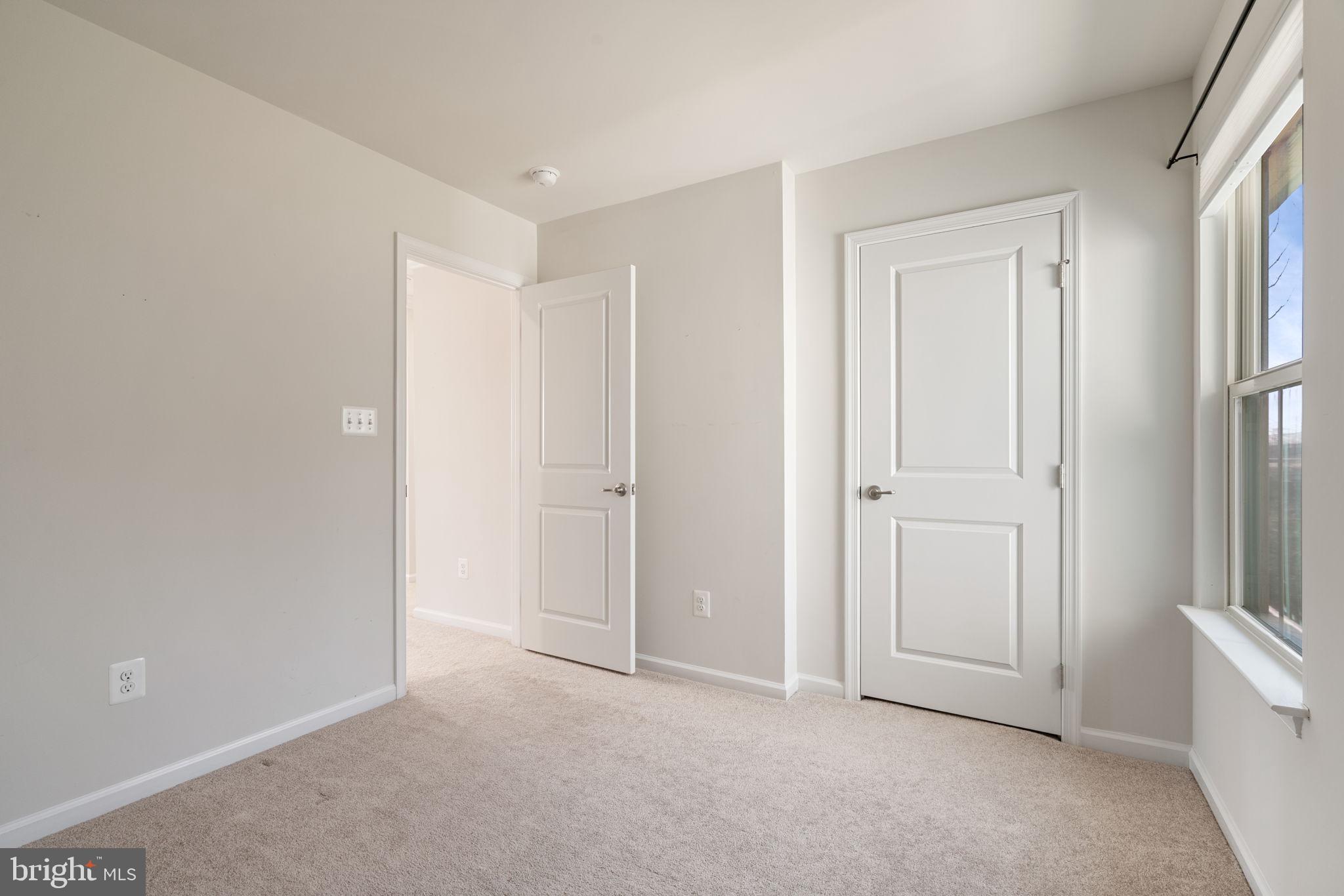 2044 Scarlet Pine Road Dumfries, VA 22026 - Photo 33 of 85 a view of an empty room and closet area