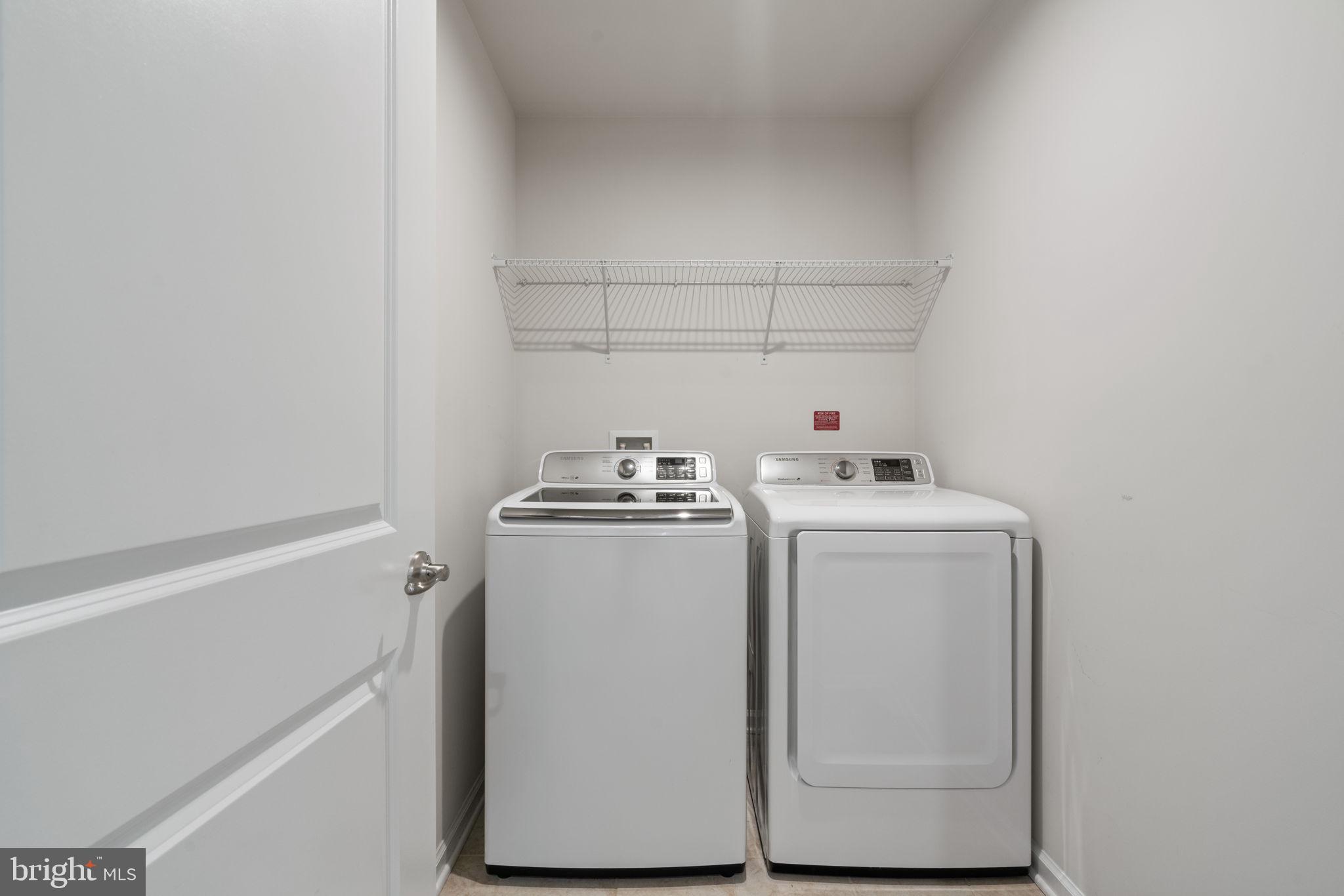 2044 Scarlet Pine Road Dumfries, VA 22026 - Photo 38 of 85 a utility room with dryer and washer