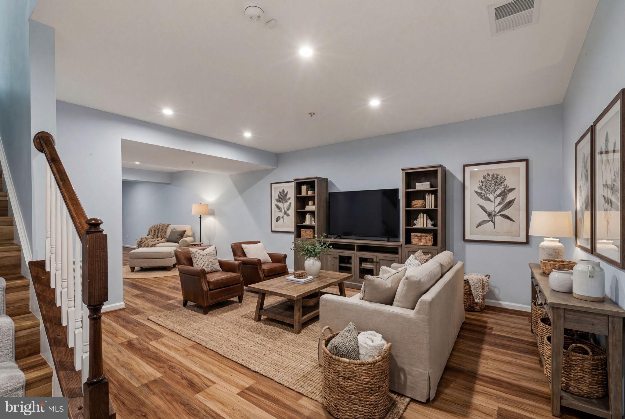 2044 Scarlet Pine Road Dumfries, VA 22026 - Photo 41 of 85 a living room with furniture and a flat screen tv