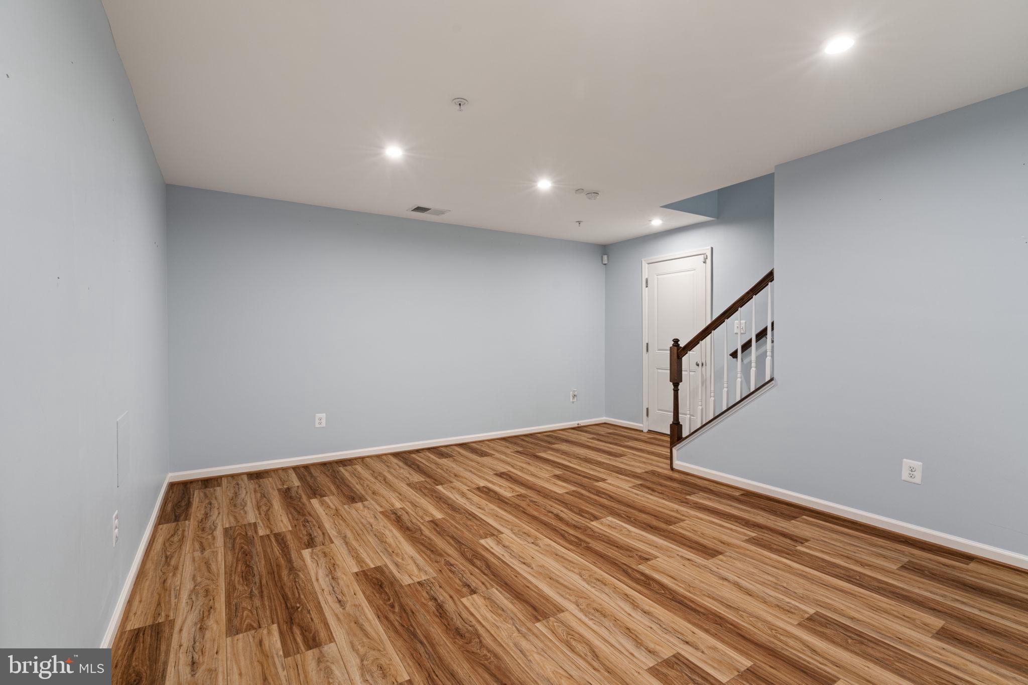 2044 Scarlet Pine Road Dumfries, VA 22026 - Photo 43 of 85 a view of empty room with wooden floor