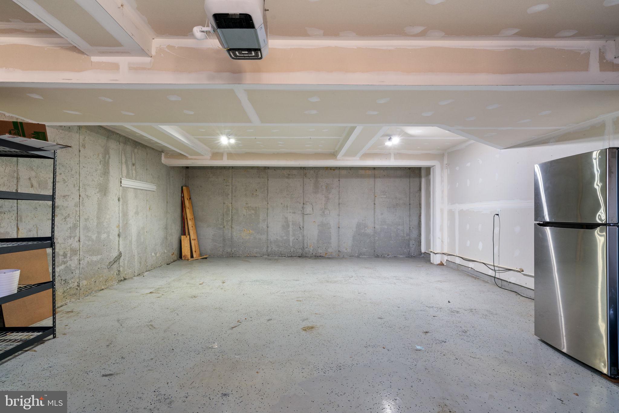 2044 Scarlet Pine Road Dumfries, VA 22026 - Photo 49 of 85 a view of a livingroom with a refrigerator