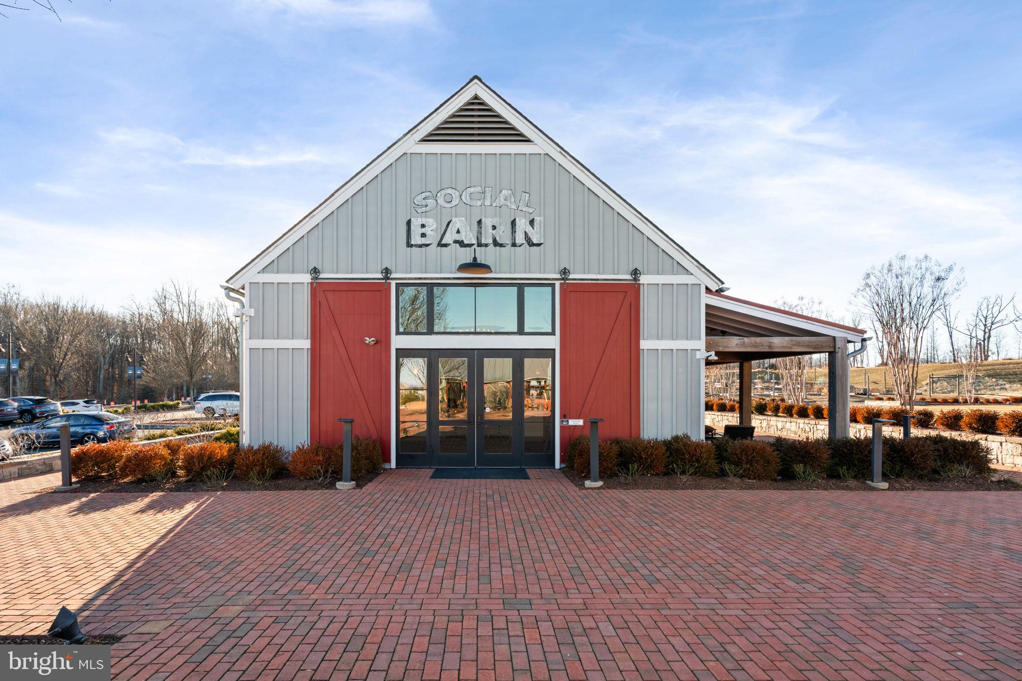 2044 Scarlet Pine Road Dumfries, VA 22026 - Photo 68 of 85 a front view of a house with a yard