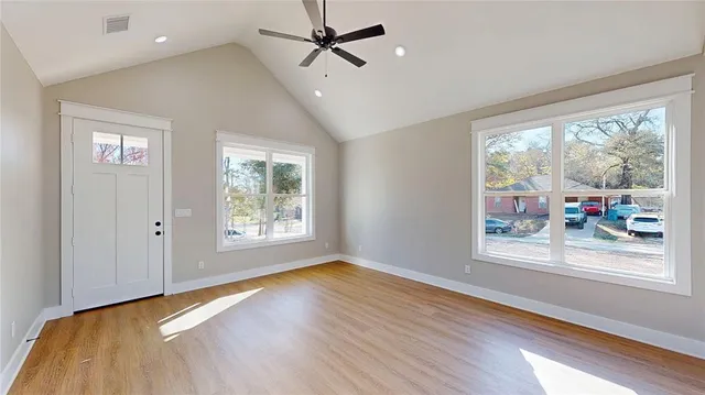 a view of an empty room with a window