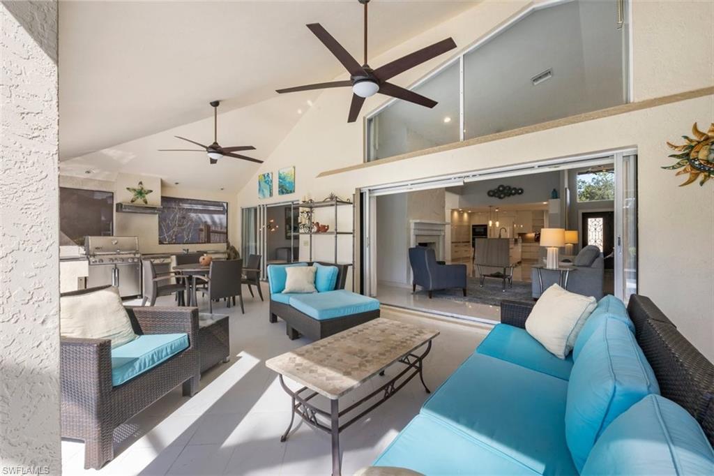 550 Cormorant Cove Naples, FL 34113 - Photo 13 of 39 a living room with furniture