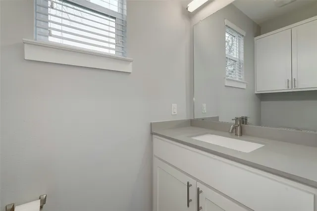 a view of a hallway with washer and dryer
