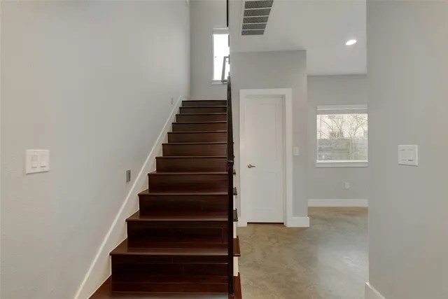 a view of an empty walk in closet