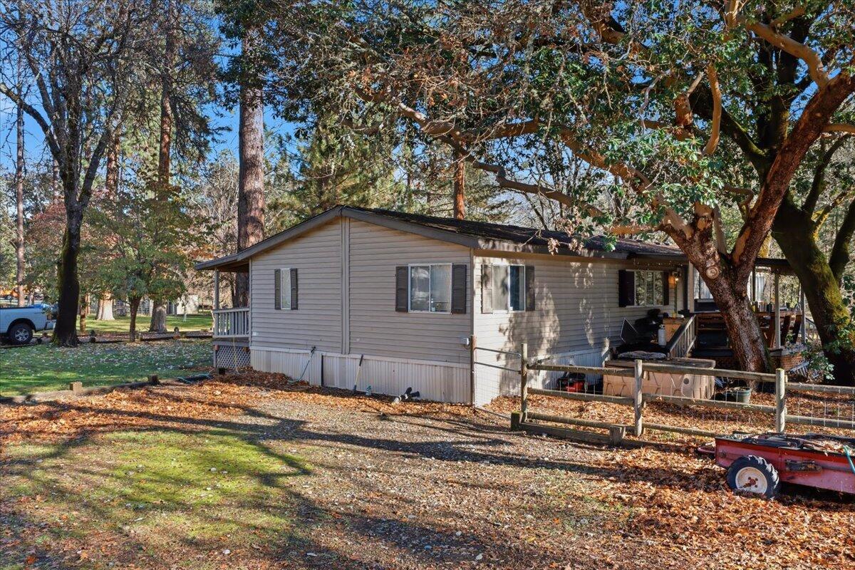1401 Upper River Road Gold Hill, OR 97525 - Photo 2 of 8 a house view with a outdoor space