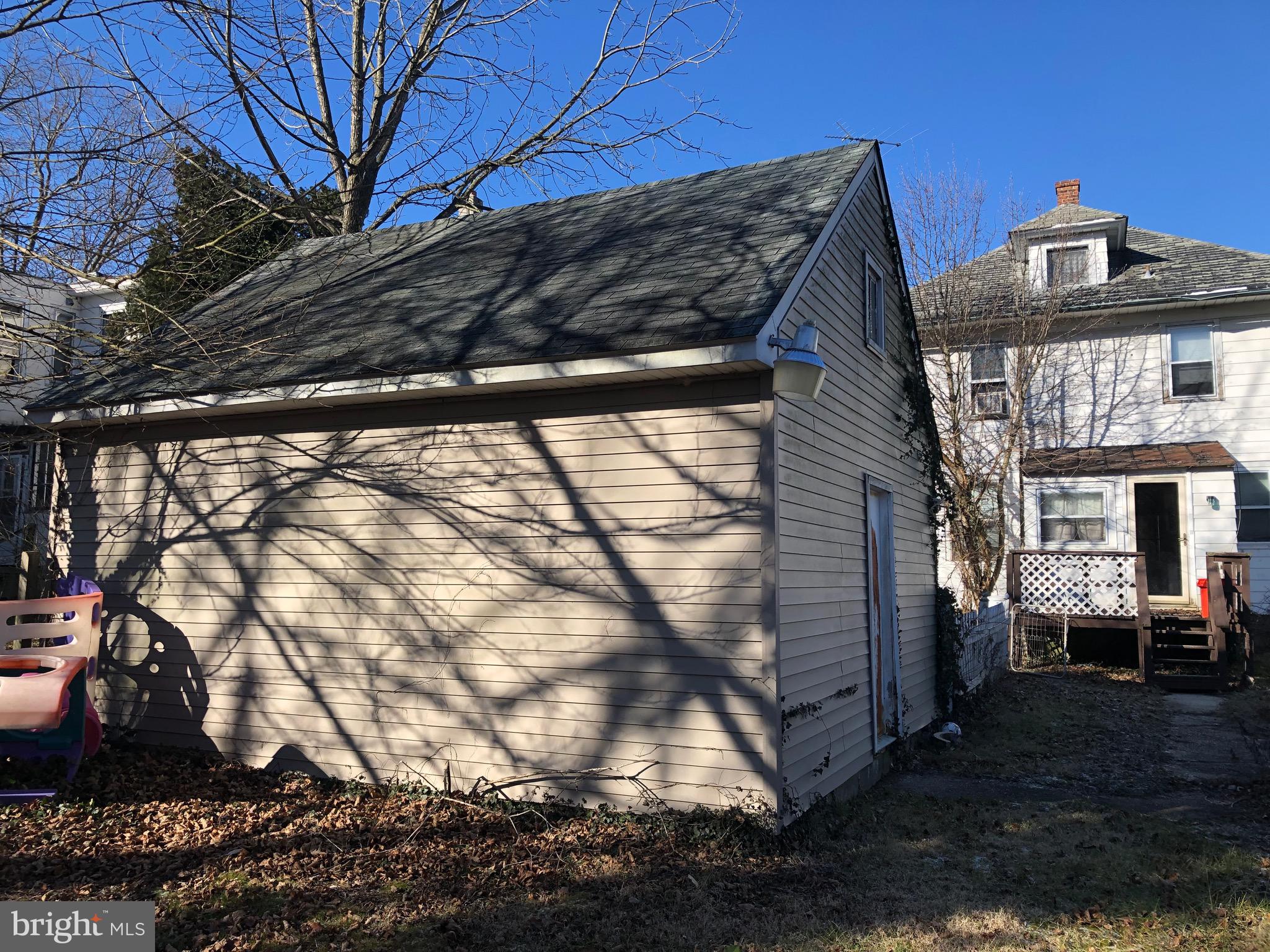 319 Atlantic Street Bridgeton, NJ 08302 - Photo 47 of 49 garage and home from back yard