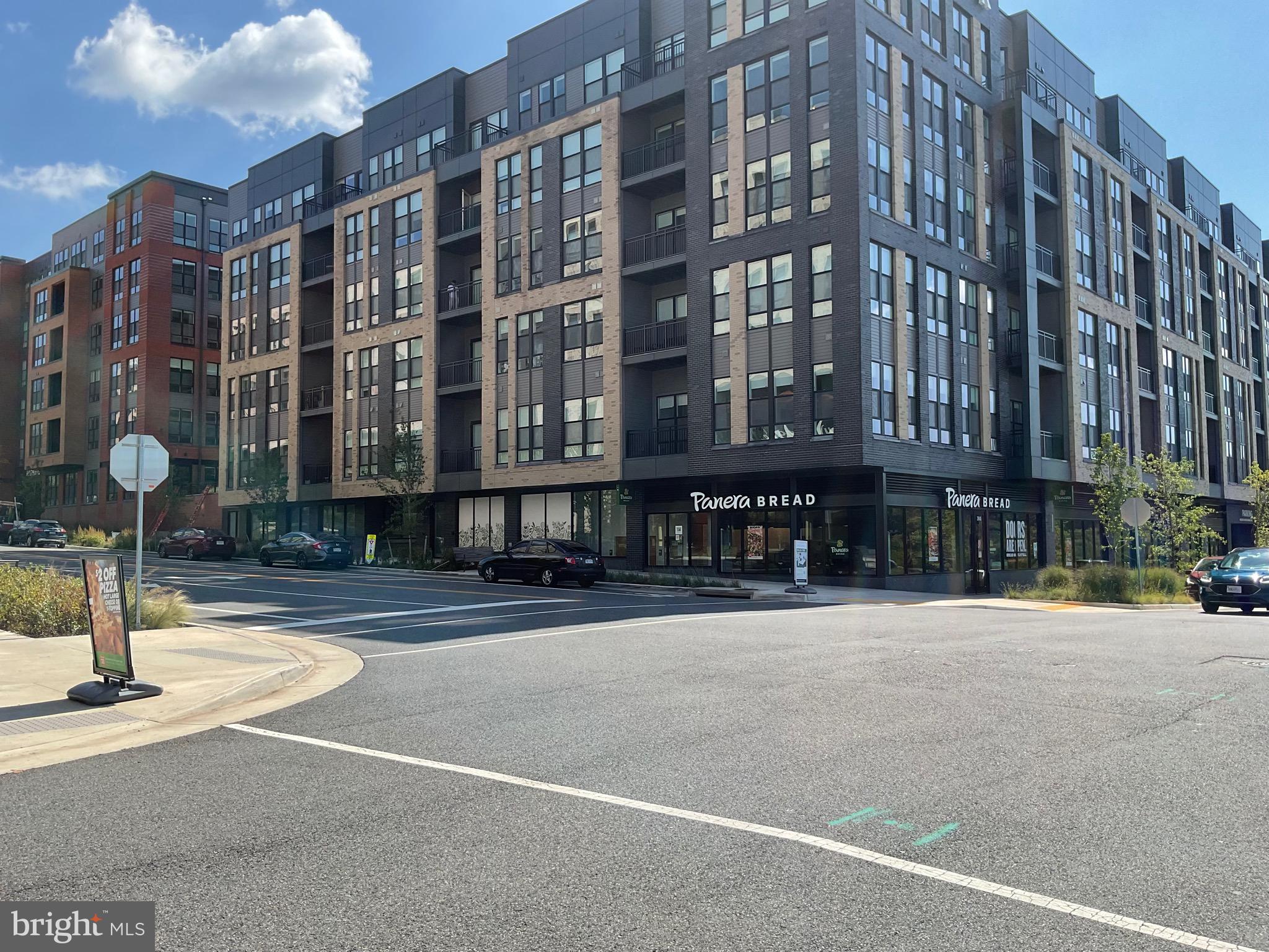 2050 Royal Fern Court, Unit 11A Reston, VA 20191 - Photo 15 of 17 a front view of a building with street view