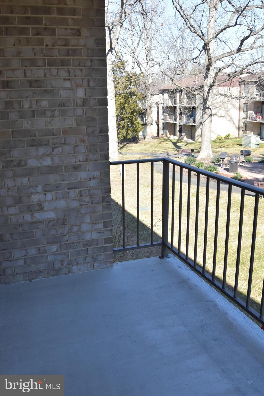 2050 Royal Fern Court, Unit 11A Reston, VA 20191 - Photo 9 of 17 a view of a balcony with an outdoor space